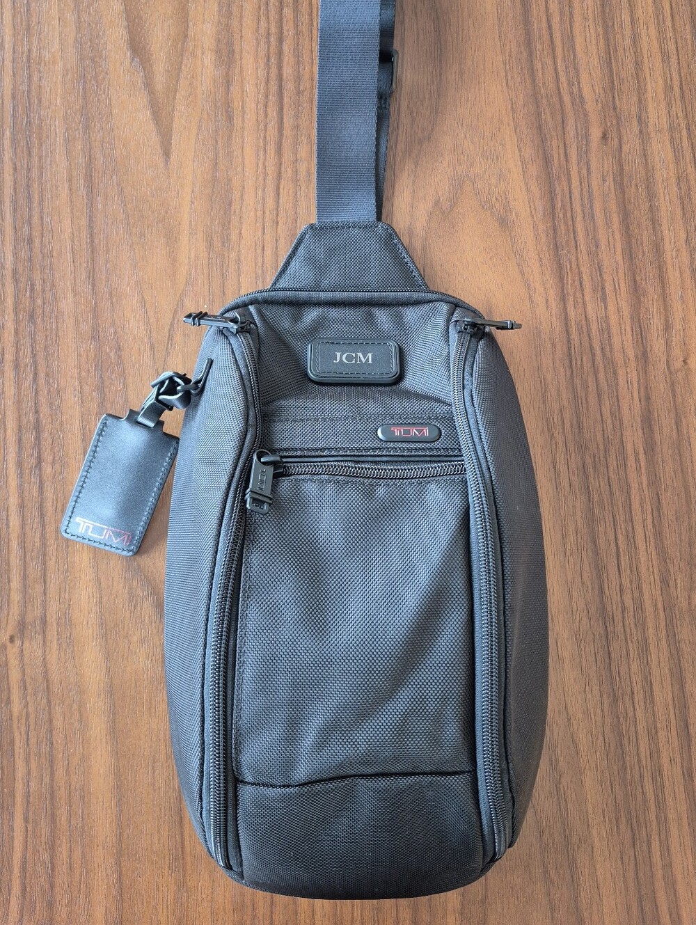 TUMI Black Crossbody Sling Bag - Compact Men's Travel Bag